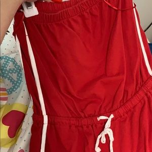 Strapless red romper with white stripes